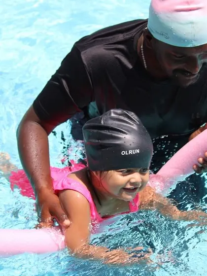 This series shows a complete lesson for our little champion, Anvika. From one-on-one instruction and floating with a noodle to practicing on a kickboard, it’s all about fun and progress.