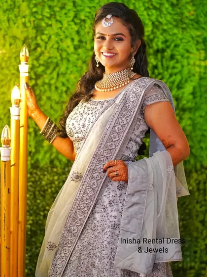 Look stunning at your reception in this elegant grey lehenga, paired with our beautiful white stone choker set. I also offer rental outfits, so you can get your complete look in one place.