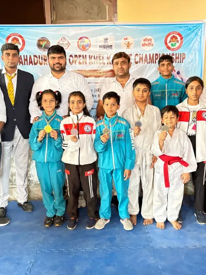 My team of young athletes from the Bahadurgarh Open, showcasing their medals.
