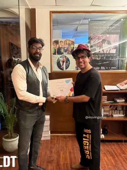 Presenting a certificate to a graduate of our PLDT program. We wish all our students the very best in their future dance endeavors.