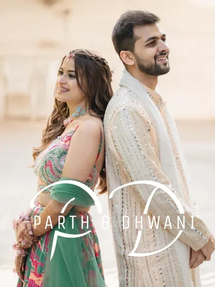 A stylish portrait of the couple from their Haldi ceremony. Their back-to-back pose and confident smiles create a modern and chic image.
