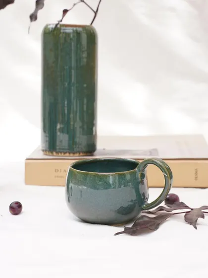 A mug and vase finished in our new Lush Green glaze. It's a reliable and beautiful choice that works consistently on both light and dark clay bodies.