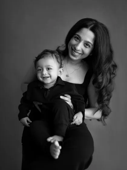 Another lovely shot of this mother and son. Her joyful smile as she holds him close is what candid portraiture is all about.