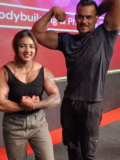My favorite photos. Posing with a fellow athlete on stage, celebrating our shared passion for bodybuilding.