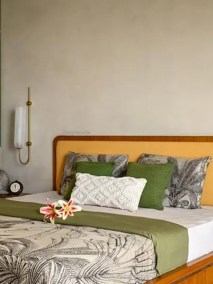 Another view of the master bedroom in 'Cover me in Sunshine', where the interplay of curves and straight lines continues. The cat approves of the cozy niche in the wardrobe.