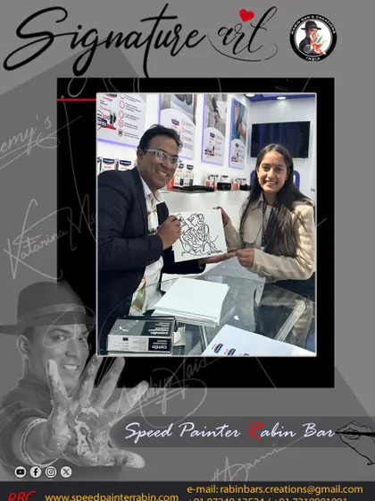 Presenting a framed signature artwork to a happy client at a Hansaplast event in Dehradun.