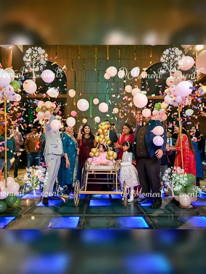 I create spectacular moments, like this grand baby entrance at a teddy bear party. I coordinated the decorative cart, the balloon drop, and the confetti blast to create a picture-perfect memory on the LED dance floor.