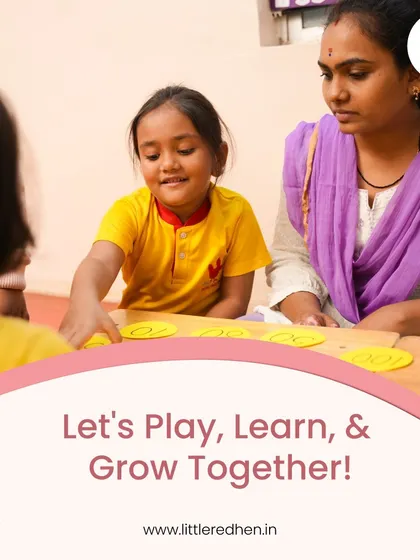 A teacher sits with a student at a table, guiding her through a learning game. We believe in turning playtime into learning time, with age-appropriate activities that stimulate curiosity and creativity.