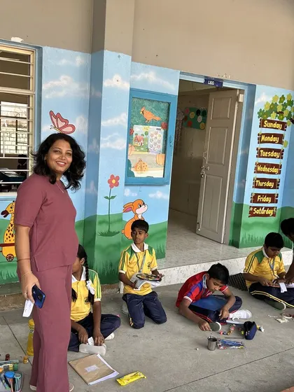 Our trainer oversees a drawing session, ensuring every child feels supported. Gentle guidance and encouragement are at the heart of our teaching philosophy, helping children to thrive.