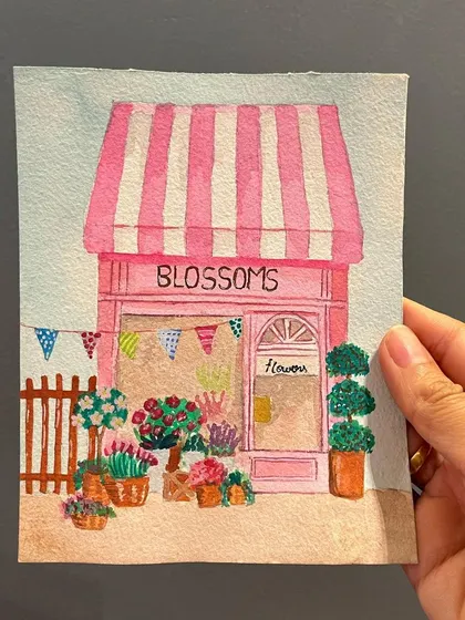 I'm so happy with how this mini watercolor of a whimsical flower shop turned out. It's a perfect little piece of art to brighten up a desk, shelf, or any small corner that needs a pop of color.