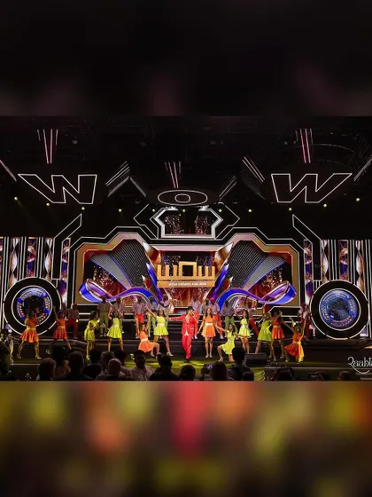 This shot captures the grand scale of the WOW Awards stage. Our choreography was designed to fill this massive space, using every inch to create a dynamic and immersive experience for the audience.