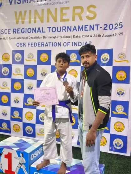 Another champion from the CISCE Regional Tournament. I stand with my student as he proudly displays his medal and certificate.