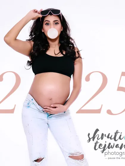 For the modern, new-age mom. This fun and edgy maternity shot with bubblegum and ripped jeans is for the mom who wants to break stereotypes and celebrate her pregnancy her way.