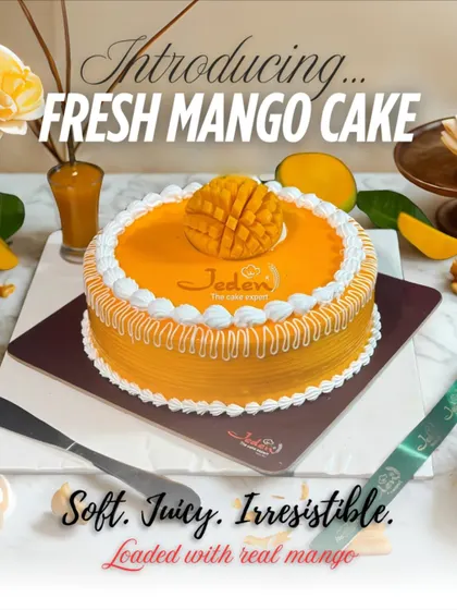 We celebrate mango season with our Fresh Mango Cake. This dessert features soft vanilla sponge, light whipped cream, and a generous topping of fresh, juicy Alphonso mango, capturing the true taste of summer.