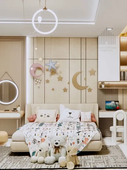 A full view of the kid's bedroom, featuring a celestial-themed wall decor, a cozy bed, and an integrated dressing table.