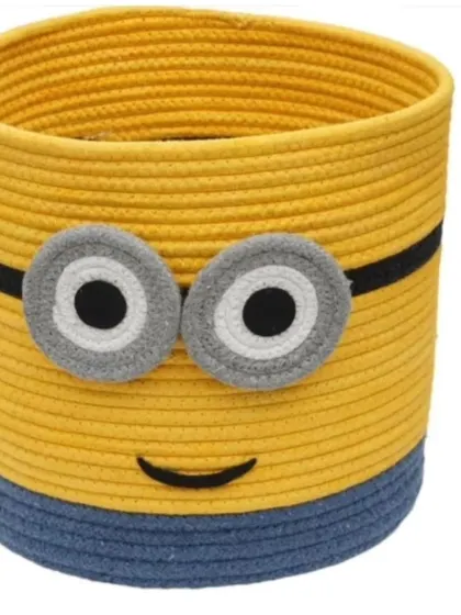 A close-up of the Minion rope basket, highlighting the quality of the cotton rope and the securely attached features.