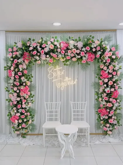 Our "Better Together" neon sign is a popular rental item for engagements, weddings, and anniversaries. It looks fantastic as a photo backdrop, especially when paired with a lush floral arch.