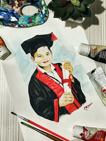 A commissioned watercolor portrait for a birthday, styled with my art supplies. If you want to bring a smile to a loved one's face, I can help you do so with art.
