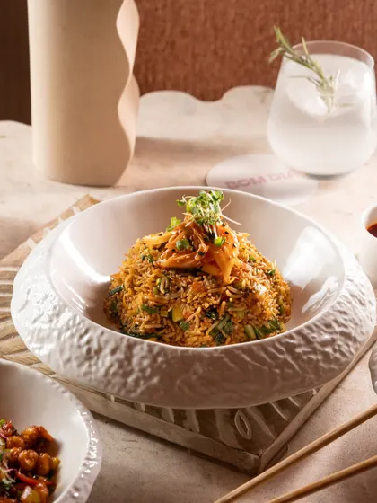 Kimchi fried rice from Bom Dia, showcasing their beautiful, custom-textured crockery.