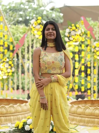 A poised shot at the Haldi ceremony, ready to kick off the festivities.