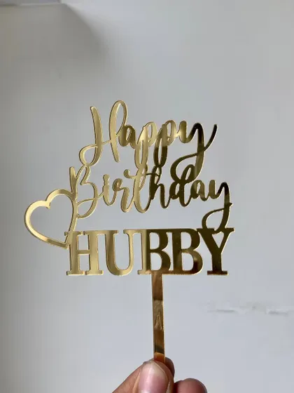 A sweet and simple message for your husband's birthday. This "Happy Birthday HUBBY" topper with a heart accent is a lovely way to show your love on his special day.