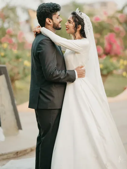 A classic couple's portrait. They look so happy and in love, and her elegant, modest gown is absolutely timeless.