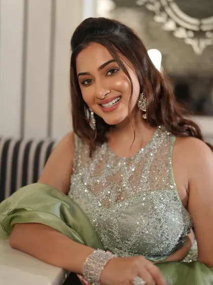 A radiant smile to complete the look. This client is glowing in her mint green sequin lehenga, perfect for a Sangeet or reception.