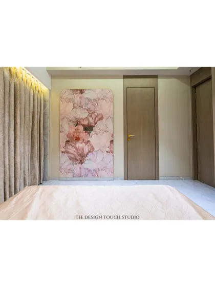 This shot highlights the custom floral art panel opposite the bed, creating a cohesive and artistic theme throughout the room.