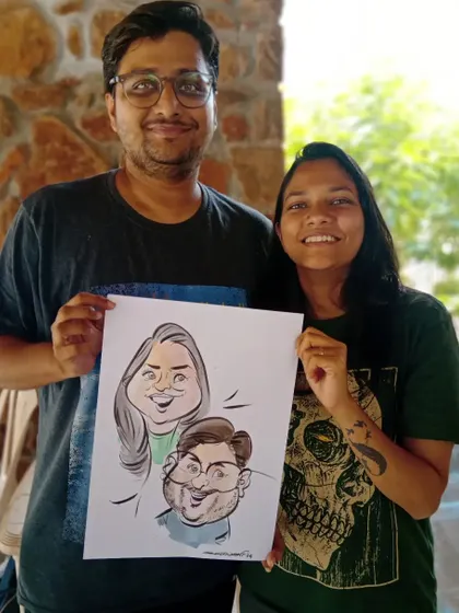 A fun couple caricature drawn live. I focus on exaggerating features in a playful way to create a humorous likeness.