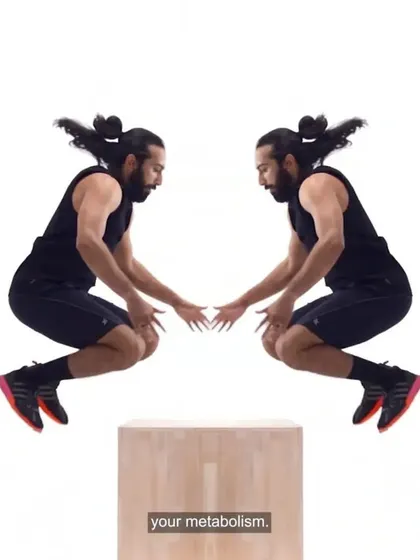 This shot captures the peak of the box jump, a key exercise for developing lower body power.