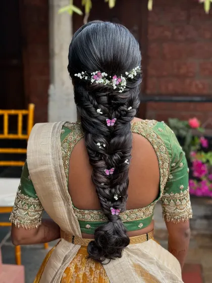 The final look of the butterfly braid, a perfect blend of modern fantasy and traditional braiding techniques.