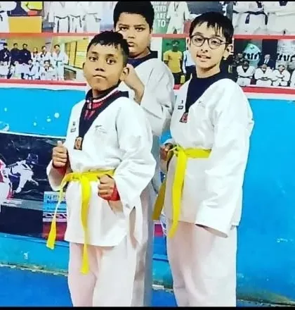 My students in their white and yellow belts, ready and focused. This is the beginning of their martial arts path.