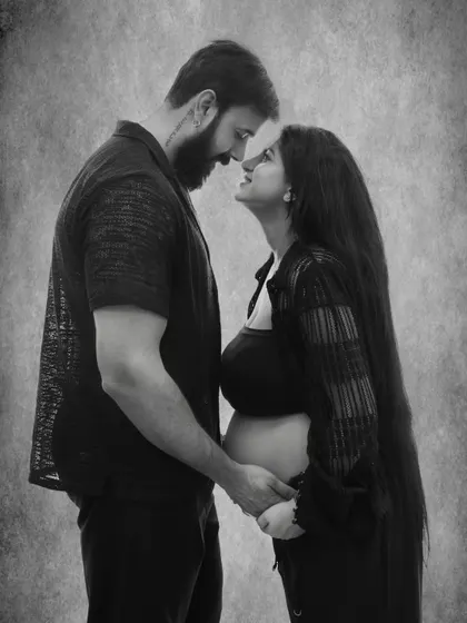 There is a unique connection between a couple as they await their child. I focus on capturing that raw emotion and anticipation in timeless black and white couple portraits.