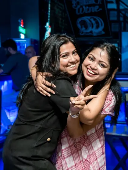 Best friends sharing a hug and a smile. These are the moments I love to see at my pub.