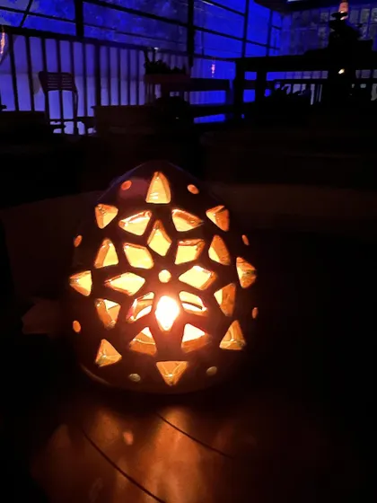 The magic of a lit tea light holder at night. The patterns it throws on the wall are just as beautiful as the piece itself.