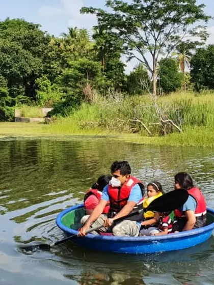Experience a traditional coracle ride, a unique and gentle way to float on the water. It's a fun group activity perfect for families to enjoy together.