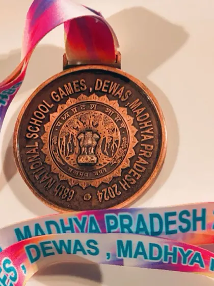 The reward for perseverance. This is the bronze medal from the U-19 boys' individuals event at the National School Games, a significant achievement for our trainee.