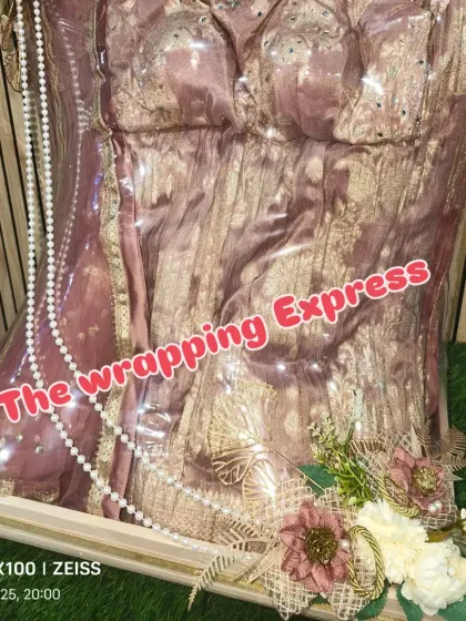 The base of the standing trousseau packing, showing the floral arrangement and how the pearl string is draped. Every detail is carefully considered.