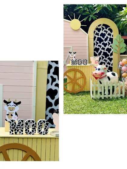 Details from the farm-themed party, including a 'MOO' sign in cow-print letters and a friendly cow prop.