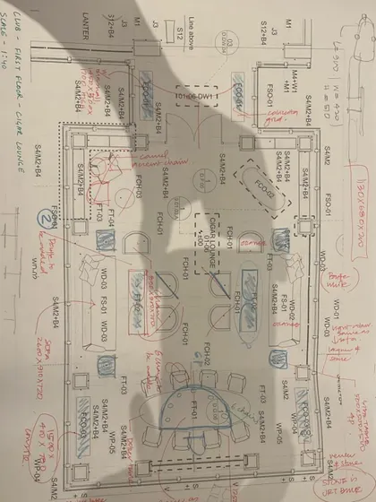 An annotated furniture layout plan for a club lounge. Every placement and selection is carefully considered to optimize flow, comfort, and social interaction.
