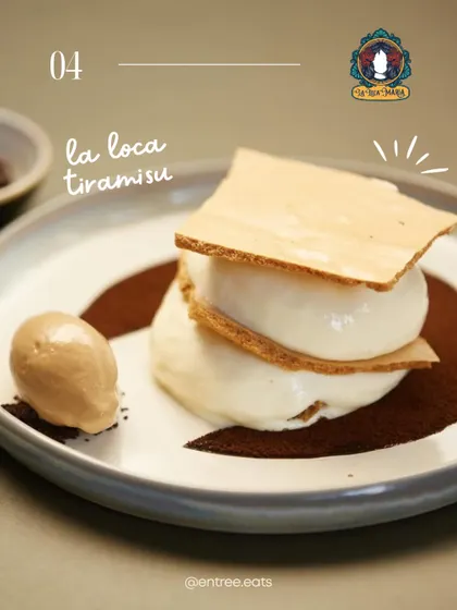 A deconstructed La Loca Tiramisu. This image showcases a modern, artistic take on the classic dessert, highlighting the creativity of the restaurant.