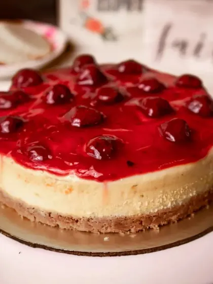 A classic New York style cheesecake with a bright and tangy cherry topping.