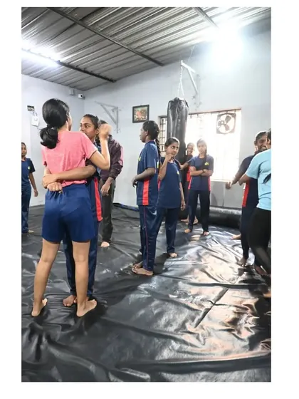 Students at the Need Base India workshop practicing how to defend against a choke from the front. We create a hands-on environment where everyone gets to try the techniques.