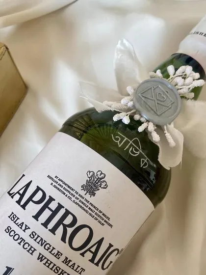 I love when my work pushes me out of my comfort zone. I engraved a name in Bengali on this gorgeous green Laphroaig bottle, along with a powerful quote. It's a joy to work with different languages and scripts.