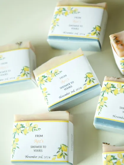 These Amalfi-inspired soap wraps were created for a bridal shower. The soaps are scented with lavender and patchouli, and the labels feature iconic Italian lemon motifs for a fresh, fun touch.