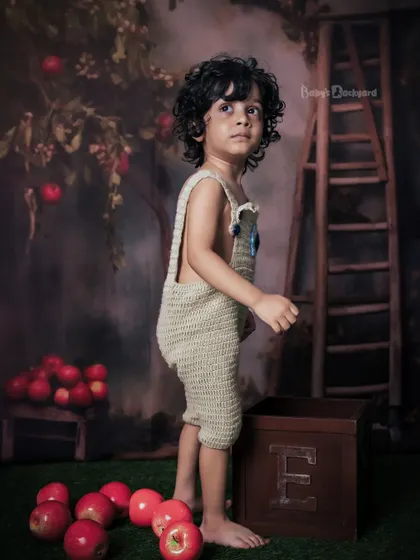 Capturing innocence, one giggle at a time. This little boy is exploring our woodland-themed set.