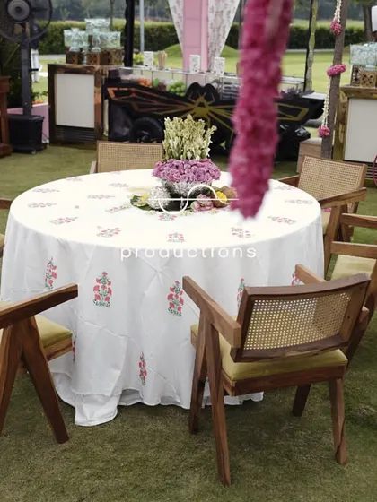 Another view of the guest seating, showing the relaxed and elegant garden party atmosphere.