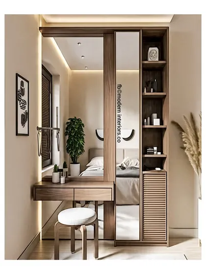 A compact and clever dressing table design, perfect for a smaller bedroom. The unit is built next to the wardrobe and features a sliding mirror that reveals hidden shelving, which is a great way to keep your vanity top clutter-free.