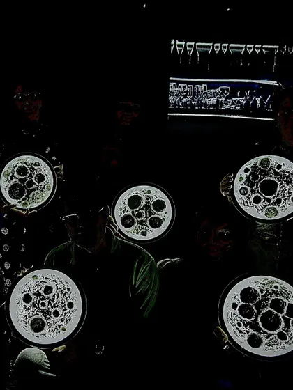 The magical glow of the finished moon lamps in the dark. It's a breathtaking moment when everyone sees their hard work light up.