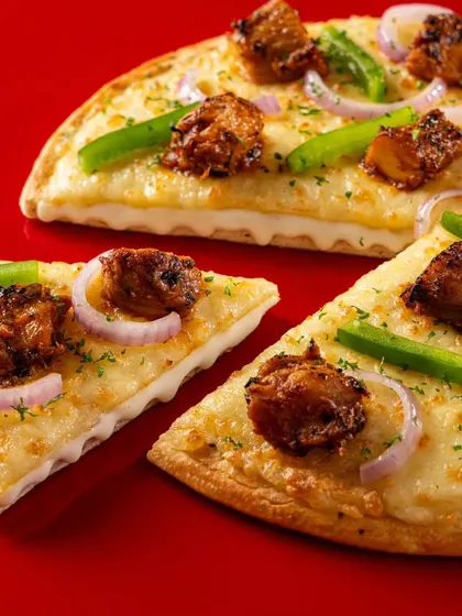 This chicken and capsicum pizza for Ovenstory is a great example of a clear, effective menu shot. The focus is entirely on the product, ensuring it looks as good as it tastes.